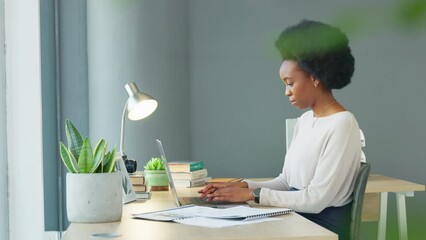 Poster - Female law student typing an assignment report online while studying at home. A black woman studying to be an advocate finishing and completing tasks at a table. Freelancer typing project documents