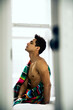 © Martha Jagodzinski/Stocksy - Male model waking up