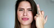 © Marco - Girl gives the finger to camera, woman showing middle finger, offensive language