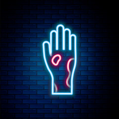 Poster - Glowing neon line Hand with psoriasis or eczema icon isolated on brick wall background. Concept of human skin response to allergen or chronic body problem. Colorful outline concept. Vector