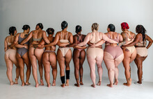 Back View Of Ten Diverse Women In Underwear