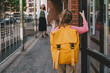 © lithiumphoto - Little girl with backpack waving her mother saying goodbye
