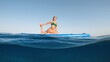 Girl on stand up paddle sup board in the sea
