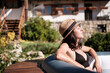 © Malquerida Studio/Stocksy - Woman relaxes on a hot tub