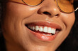 © BONNINSTUDIO/Stocksy - Cheerful black woman with white teeth