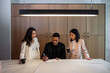 © Bisual Studio/Stocksy - Diverse designers working on project in kitchen
