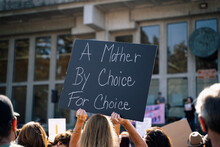 Protest Sign Reading: "A Mother By Choice For Choice"