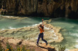© Luis Herrera/Stocksy - happy woman enjoying nature