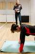 © Marco Govel/Stocksy - Mother and baby attending a postpartum recovery class