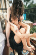 © Yura Shevchenko/Stocksy - story of a real day of a couple two young women living together