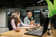 © STUDIO TAURUS/Stocksy - Colleagues Talking In The Office