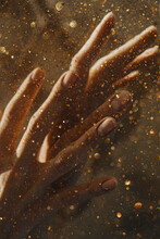 Photo Of Hands Under Water With Gold Glitter