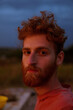© Alexander Gospodinov/Stocksy - Red-haired beard man's portrait