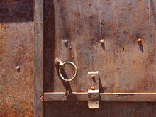 Part Of An Old Rusty Metal Door