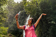 © Luis Herrera/Stocksy - Woman Taking Selfie In Nature
