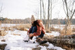 © Léa Jones/Stocksy - young woman tying her skates