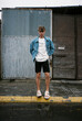 © BONNINSTUDIO/Stocksy - Stylish teenage boy on the street