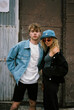 © BONNINSTUDIO/Stocksy - Trendy young couple on the street