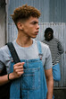 © BONNINSTUDIO/Stocksy - Diverse trendy youngsters on the street