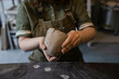 © Asya Molochkova/Stocksy - The creative process of creating a clay mug by a female ceramist