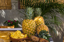 Pineapples On A Table