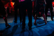 © Léa Jones/Stocksy - anonymous group of feet dancing at a party