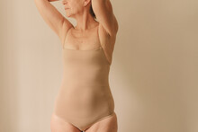 Crop Mature Woman In Neutral Underwear