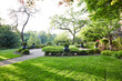 © Trinette Reed/Stocksy - Lush landscaping grounds in backyard