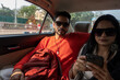 © Dream Lover/Stocksy - Indian young couple travelling in a car at urban city