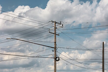Clouds, Poles, And Wires