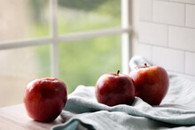 Juicy Red Apples By The Window