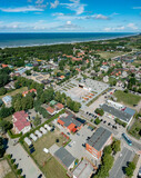Fototapeta  - Seaside town Sventoji in Lithuania on Baltic sea shore, very visited summer tourist location for cheap accommodation and party, sandy beach