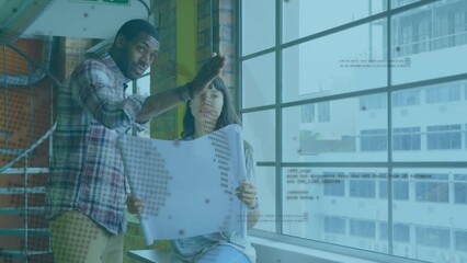 Wall Mural - Animation of globe and data processing over diverse female and male coworkers in office