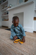 Boy (2-3) playing with toy cars