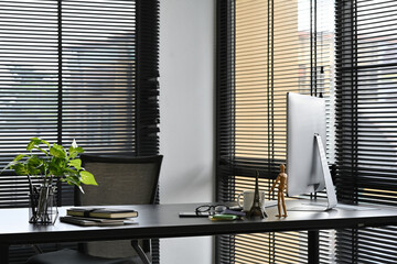 Poster - Modern office workspace with desktop computer, office supplies, small plant and books at office. desk work concept.