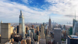 Fototapeta  - New York City skyline at sunset, roof top Manhattan urban skyscrapers. New York, USA. Panoramic image.