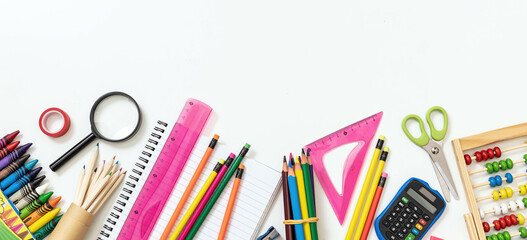 Back to school background. School office supply and stationery flat lay on white, top view