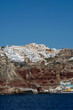 View of the picturesque village of Oia and the the famous Ammoudi harbour in Santorini Greece