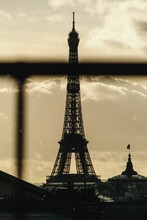 Vertical Shot Of The Silhouette Of The Eiffel Tower At Sunset