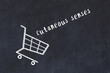 Chalk drawing of shopping cart and word cutaneous senses on black chalboard. Concept of globalization and mass consuming