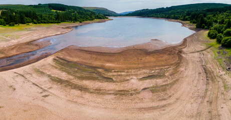 Wall Mural - Aerial view of extremely low water levels at a reservoir during a summer heatwave