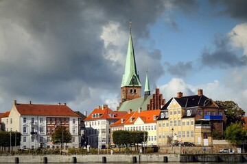 Canvas Print - Very autumnal looking sky hangs over Helsingor city with a promise of sunshine and showers