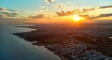 Aerial Shot Of A Beautiful Sunset Over The City Of Torrevieja In Alicante, Spain