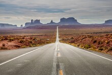Straight Road Under A Stormy Sky In Monument Valley, Utah-Arizona, USA