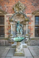 Poster - Vertical shot of Frederiksborg Castle fountain, Hillerod, Denmark