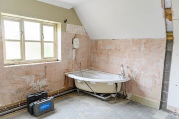 Sticker - Old bathroom with bathtub under construction