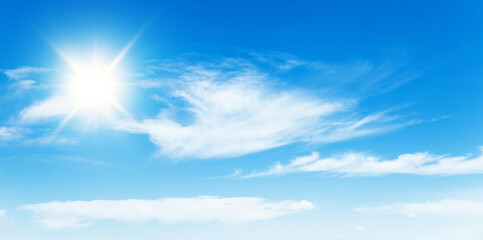 Wall Mural - sunny day background, blue sky with white cumulus clouds and sun