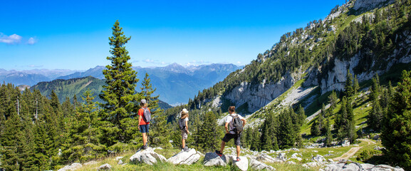 family hiking in the mountain- france, massif des bauges