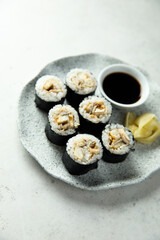 Wall Mural - Eel sushi with soy sauce and ginger