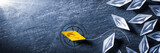 Fototapeta Dmuchawce - Yellow Paper Boat With Compass Leaving Group And Changing Direction - Entrepreneur/Business Opportunity